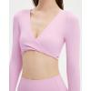 imageSUUKSESS Women 2 Piece Workout Sets Long Sleeve Twist Deep V Crop Padded Tops Yoga Leggings with Side PocketsLight Pink