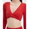 imageSUUKSESS Women 2 Piece Workout Sets Long Sleeve Twist Deep V Crop Padded Tops Yoga Leggings with Side PocketsRed